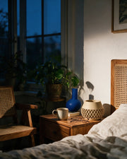 Lattice Bud Planter – at night on a bedside table