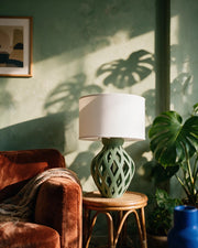Lattice Bulb Table Lamp – on a side table at golden hour