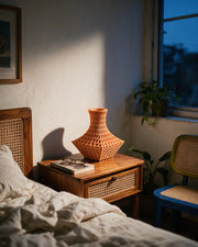 Mesh Flare Vase – at night on a bedside table