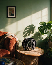 Openwork Display Stand – on a side table at golden hour