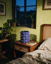 Orbicube vase – at night on a bedside table