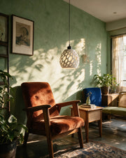 Organic Hole Pendant Light – on a side table at golden hour