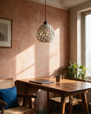 Organic Hole Pendant Light – on a work desk in morning sun