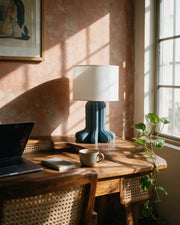 Organic Leg Table Lamp – on a work desk in morning sun