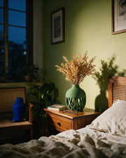 Oval Cut Vase – at night on a bedside table