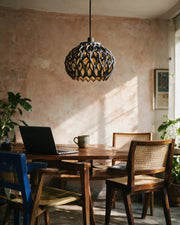 Oval Lattice Pendant Light – on a work desk in morning sun