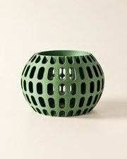 Oval Perf Orchid Planter – three-quarter studio view