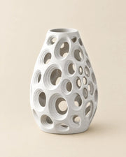 Oval Perf Vase – three-quarter studio view