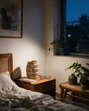 Oval Slot Vase – at night on a bedside table