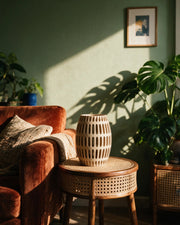 Oval Slot Vase – on a side table at golden hour