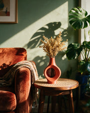 Oval Window Vase – on a side table at golden hour