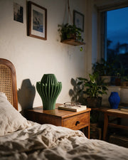 Petal Blade Vase – at night on a bedside table