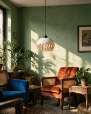 Petal Flame Pendant Light – on a side table at golden hour