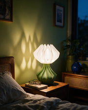 Petal Shade Table Lamp – at night on a bedside table