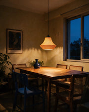 Pleat Flare Pendant Light – at night on a bedside table