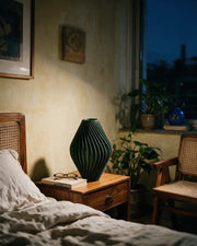 Pleat Hourglass Vase – at night on a bedside table