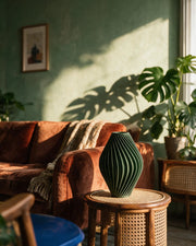 Pleat Hourglass Vase – on a side table at golden hour