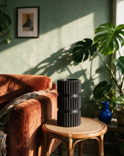 Pleat Stack Vase – on a side table at golden hour