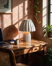 Polka Pleat Table Lamp – on a work desk in morning sun