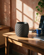 Pore Cylinder Planter – on a work desk in morning sun