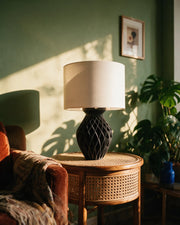 Quilt Bulb Table Lamp – on a side table at golden hour