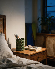 Quilt Pen Cup – at night on a bedside table