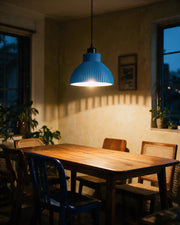 Rib Bell Pendant Light – at night on a bedside table