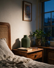 Rib Bottle Vase – at night on a bedside table