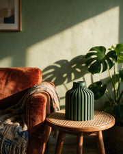 Rib Bottle Vase – on a side table at golden hour