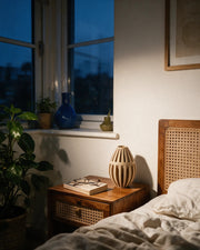 Rib Bud Vase – at night on a bedside table