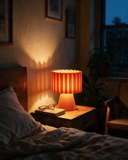 Rib Drum Mini Lamp – at night on a bedside table