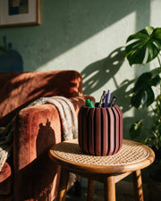 Rib Drum Pen Cup – on a side table at golden hour