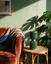 Rib Hourglass Vase – on a side table at golden hour