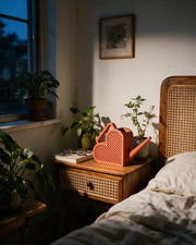 Rib Panel Watering Can – at night on a bedside table