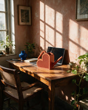 Rib Panel Watering Can – on a work desk in morning sun