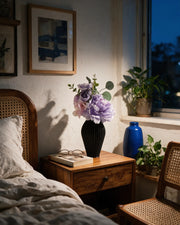 Rib Urn Vase – at night on a bedside table