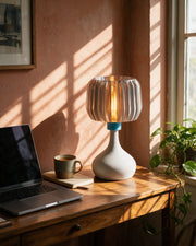 Ribbed Globe Table Lamp – on a work desk in morning sun