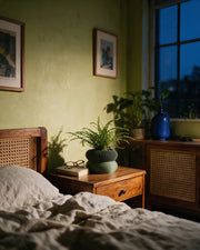 Ribbed Pedestal Planter – at night on a bedside table