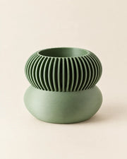 Ribbed Pedestal Planter – three-quarter studio view