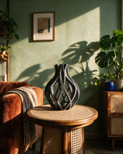 Ribbon Swirl Vase – on a side table at golden hour