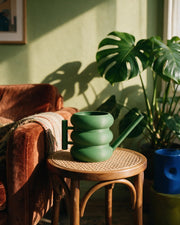Ring Stack Watering Can – on a side table at golden hour