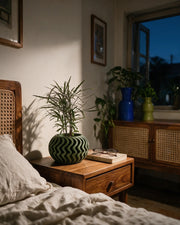 Ripple Fin Planter – at night on a bedside table