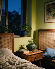 Slat Bowl Planter – at night on a bedside table