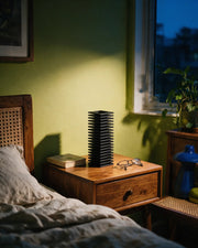 Slat Tower Vase – at night on a bedside table