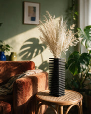 Slat Tower Vase – on a side table at golden hour