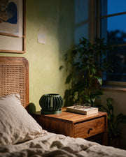 Slot Sphere Orchid Planter – at night on a bedside table