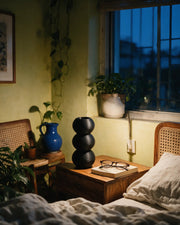 Sphere Stack Vase – at night on a bedside table