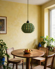 Spike Orb Pendant Light – styled on a console
