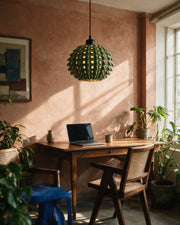 Spike Orb Pendant Light – on a work desk in morning sun