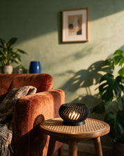 Spiral Tealight Holder – on a side table at golden hour